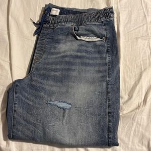 Distressed pull up  size 18 flare jeans from Lane Bryant. Worn once.